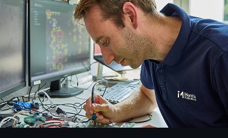Mantis team member working on a robot
